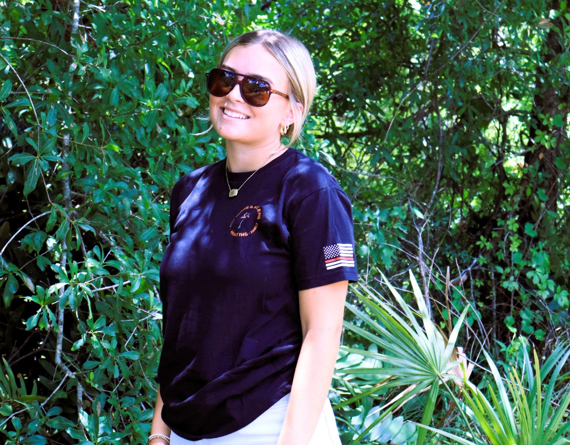 Irons and Antlers logo tee worn outdoors